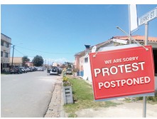 Protest Postponed Quigney